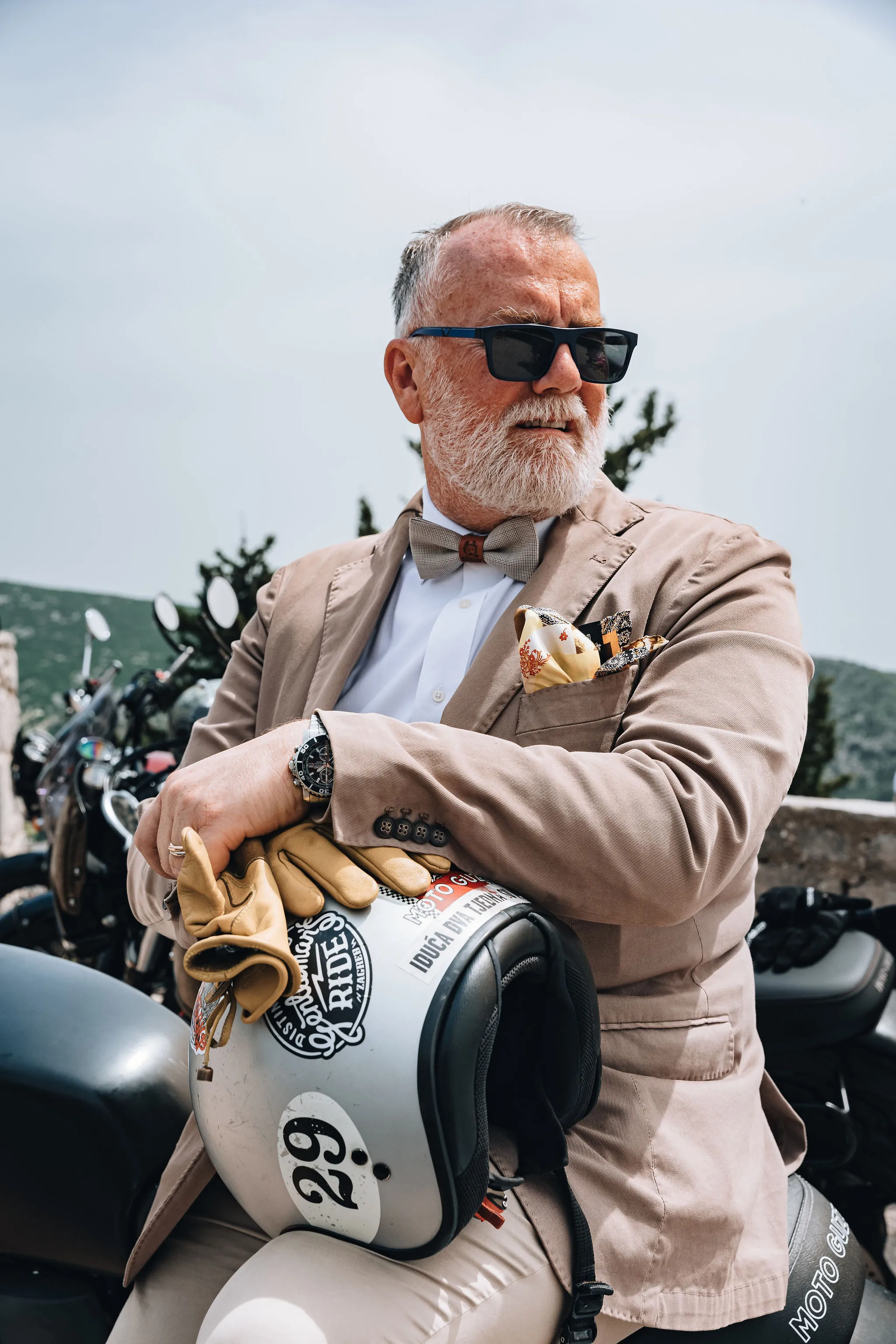 Distinguished Gentleman's Ride — Split 2024 — tan linen suit portrait