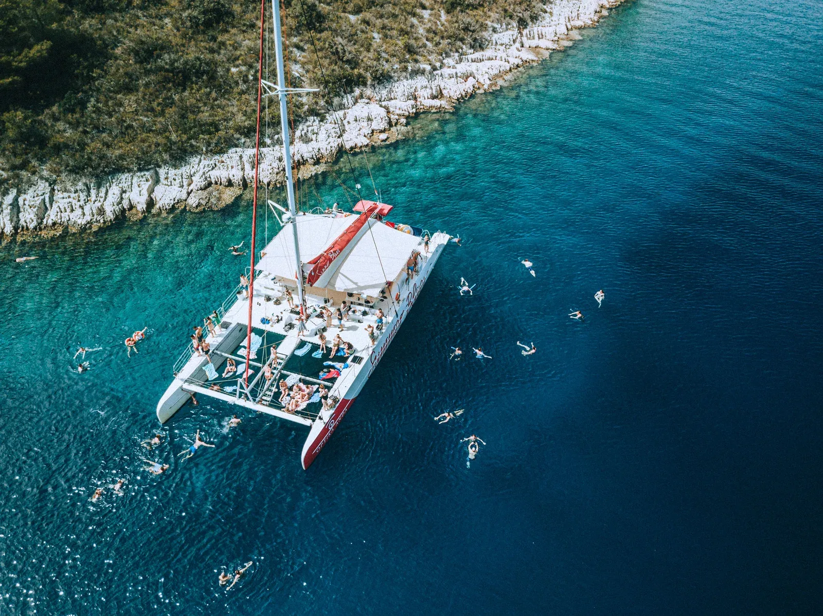 Aerial view of the Summer Blues catamaran during a swim stop
